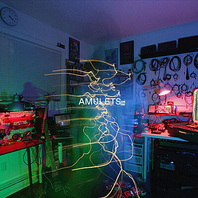 Amulets - Between Distant And Remote